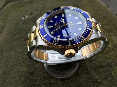 rolex submariner date gold blue|Rolex Submariner blue dial bezel.